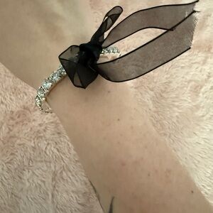 Elegant Black and Silver Bracelet with Ribbon